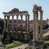 Remains of the Temple of the divine Vespasian and Titus at Forum Romanum (on the right), remains of the Temple of Saturn (on the left)