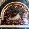 Interior of the Basilica of San Pietro in Vaticano, repeating motif of a dove with an olive branch in its beak – the  Pamphilj family coat of arms