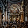 Basilica Sant’Andrea delle Fratte, view of the apse with two angels flanking it – Gian Lorenzo Bernini