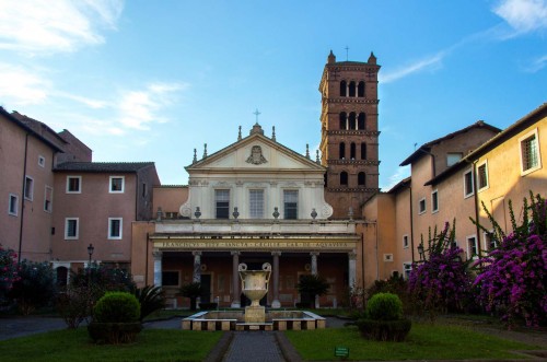 Façade of the Basilica of Santa Cecilia and monastery buildings on both sides