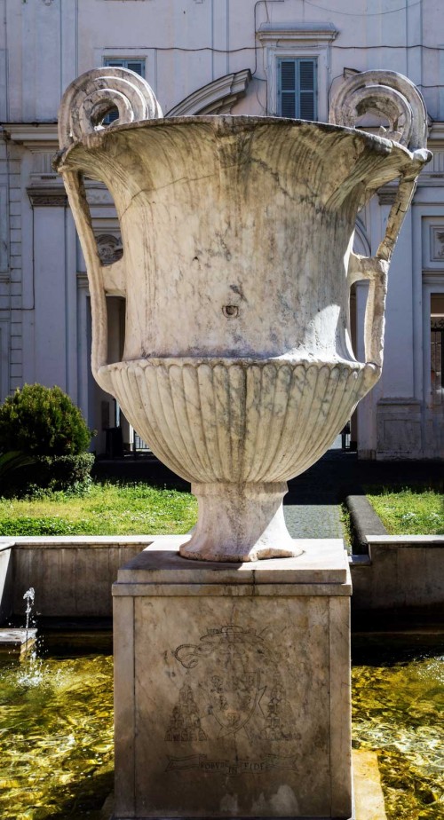 Basilica of Santa Cecilia, fountain with kantharos in the atrium