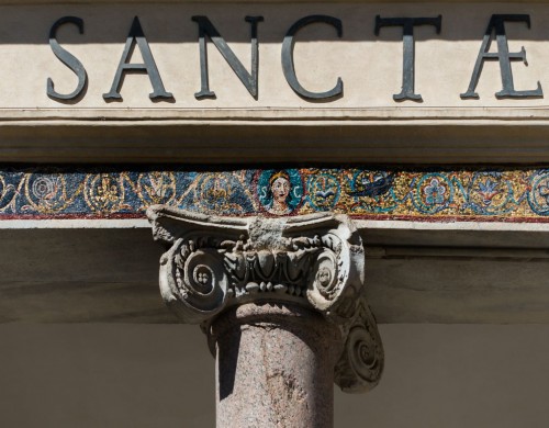 Basilica of Santa Cecilia, mosaic frieze in the portico of the church façade with image of St. Cecilia