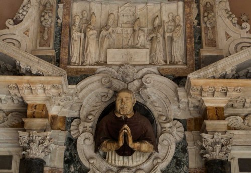 Basilica of Santa Cecilia, image of cardinal Sfondrati, fragment of the tombstone in the church vestibule