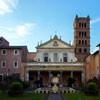 Façade of the Basilica of Santa Cecilia and monastery buildings on both sides