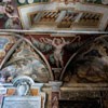 Basilica of Santa Cecilia, frescoes in the vestibule representing the saints with a landscape in the background, XVI century