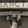 Basilica of Santa Cecilia, mosaic frieze in the portico of the church façade with image of St. Cecilia