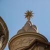 Church of Sant'Ivo alla Sapienza, six mountains and an eight-pointed star – elements of the coat of arms of Pope Alexander VII Chigi, element  flanking the façade