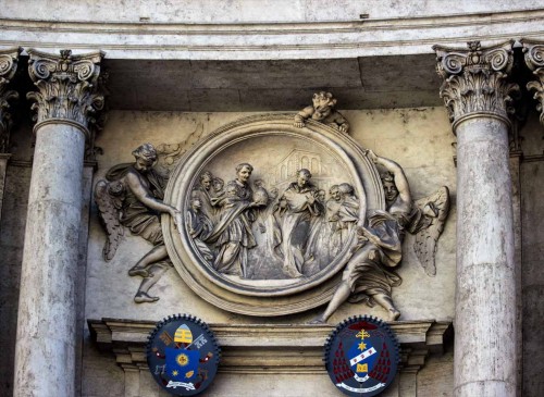 Church of San Marcello, medallion in the lintel of the church depicting St. Philip Benizi Refusing the Tiara, Antonio Raggi