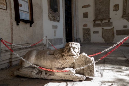 Ambulatory of the Church of San Marco, one of the lions guarding the church enterance