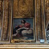 Church of Santissimi Nomi di Gesù e Maria, decoration between the windows, image of St. John the Evangelist