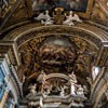 Church of Santissimi Nomi di Gesù e Maria, top of the main altar and a paiting at the top of the apse – Giacinto Brandi