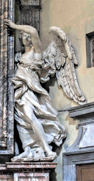 Basilica of Santa Maria del Popolo,  figure of an angel supporting a painting – left transept