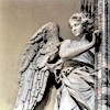 Church of Santa Maria del Popolo, figure of an angel supporting a painting – left transept