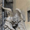 Basilica of Santa Maria del Popolo,  figure of an angel supporting a painting – left transept