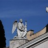 Church of San Rocco, Angel topping off the façade