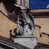 Church of San Rocco, Angel topping off the façade