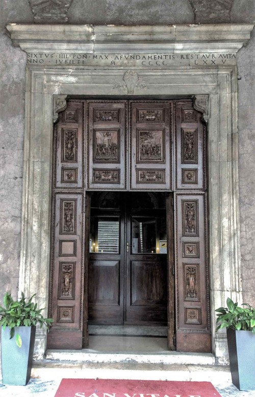 Basilica San Vitale, enterance door with scenes of the Martyrdom of SS Gervasius and Protasius