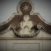 Porta del Popolo, top of the gate – coat of arms of Pope Alexander VII Chigi, inscription prepared for the entry of Queen Christina