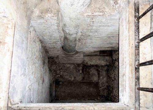 Church of Santa Sabina, side nave, remains of the ancient floor and fragment of a column of the old house of Sabina