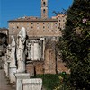 Statues of the Vestals in the atrium of the House of the Vestals at the Temple of Vesta, Capitol in the background