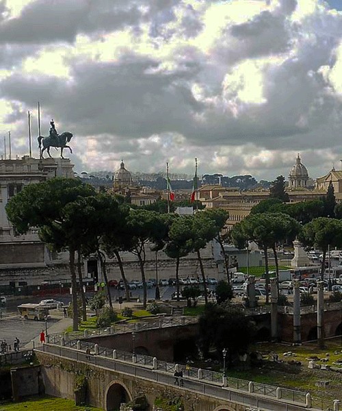 Via dei Fori Imperiali, view of the Forum of Trajan, Altar of the Fatherland (on the left), Trajan’s Column (on the right)