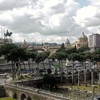 Via dei Fori Imperiali, view of the Forum of Trajan, Altar of the Fatherland (on the left), Trajan’s Column (on the right)