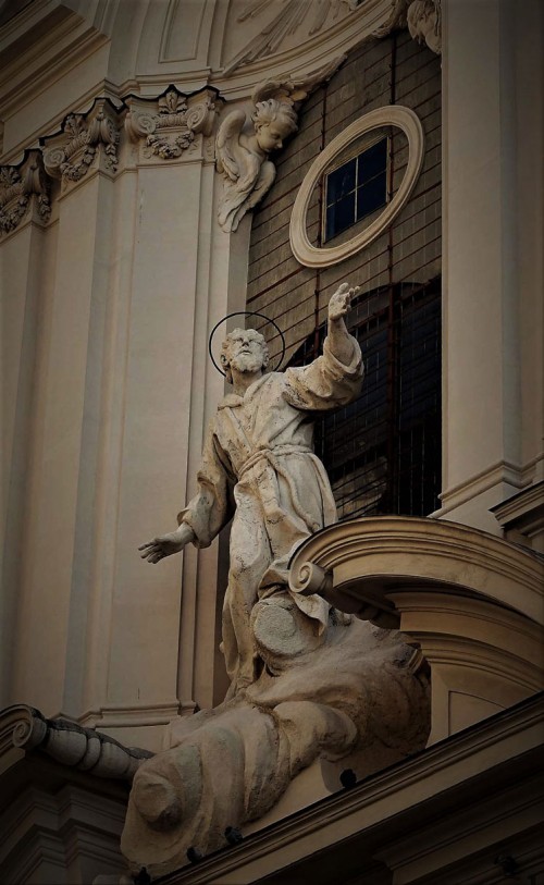 Attributed to Antonio Raggi figure of St. Francis above the enterance to the Church of San Francesco dei Stigmati