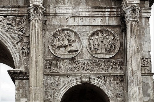 Triumphant Arch of Emperor Constantine the Great, medallion depicting Emperor Hadrian and frieze with the victorious battle of Constantine on Milvian Bridge