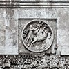 Triumphant Arch of Emperor Constantine the Great, medallion showing the God Sol Invictus, at the bottom frieze with Constantine entering Rome