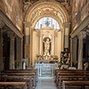 Interior of the Church of Santa Bibiana with a statue of St. Bibiana in the apse