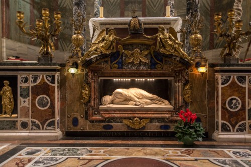 A round porphyry slab covering the burial place of Cardinal Sfondrati in front of the statue of St. Cecilia, Church of Santa Cecilia