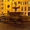 Piazza Farnese, one of the two fountains, on the left the facade of the Church of Santa Brigida