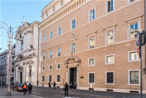 Church of Sant'Apollinare, next to the building designed by Ferdinand Fuga, currently the seat of the Pontifical University of the Holy Cross