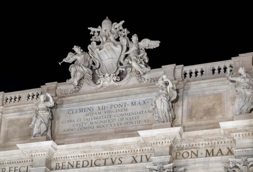 Fontana di Trevi, inscription commemorating the creation of the monument and the coat of arms of Pope Clement XII