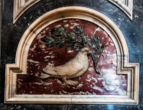 Interior of the Basilica of San Pietro in Vaticano, repeating motif of a dove with an olive branch in its beak – the  Pamphilj family coat of arms