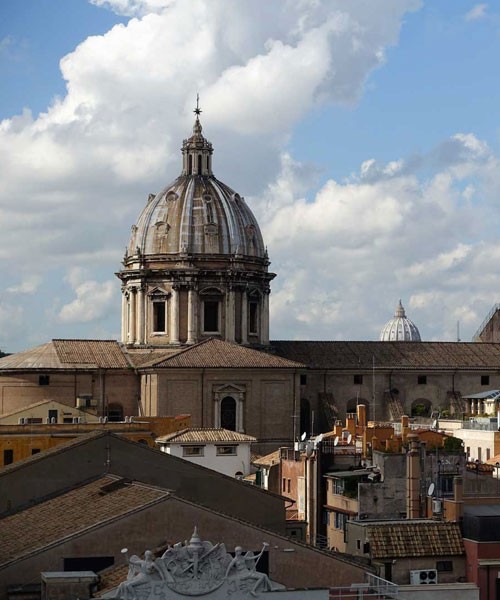 Dome of the Basilica of Sant’Andrea della Valle, in the background the dome of St. Peter’s Basilica