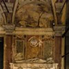 Basilica of Santa Cecilia, tombstone of Adam Easton, frescoes of the church vestibule in the background