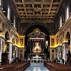 San Lorenzo in Lucina, wnętrze, widok na obraz Guido Reniego - Ukrzyżowanie