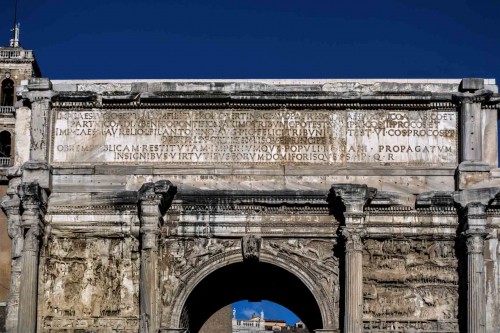 Triumphant arch of Emperor Septimius Severus seen from the Forum Romanum, inscription commemorating the emperor