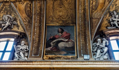 Church of Santissimi Nomi di Gesù e Maria, decoration between the windows, image of St. John the Evangelist