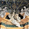 San Giovanni Baptistery, baroque angels adorning a niche in the Chapel of SS. Justina and Cyprian