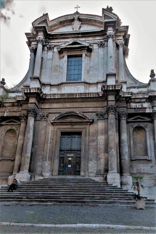 Façade of the Church of San Nicola da Tolentino, inscription commemorating the foundation of Prince Camillo Pamphilj and family coats of arms
