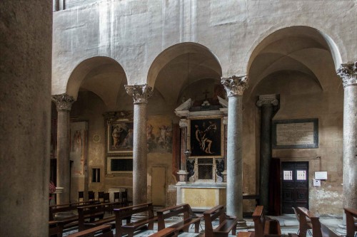 Basilica of Santi Quattro Coronati, left nave with enterance to the monastery cloisters