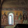 Basilica of Santi Quattro Coronati, entrance wall, frescoes from the XIV century, Bishop Rainaldus, St. Augustine and three other saints