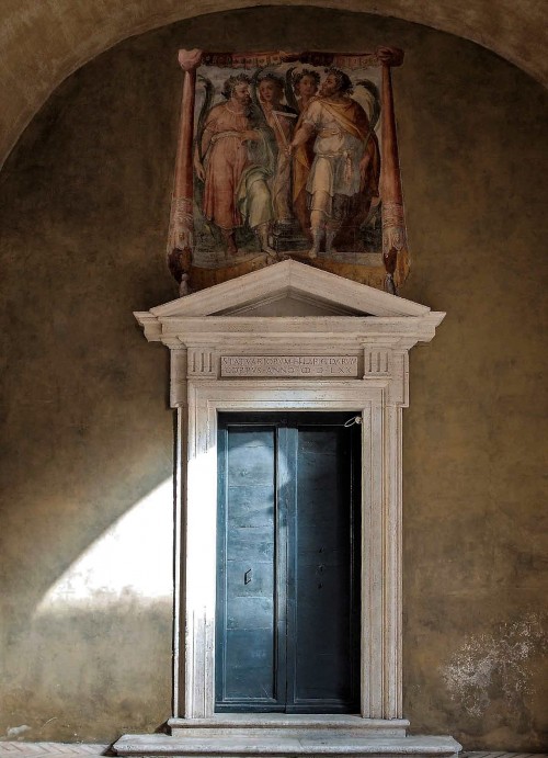 Oratorio San Silvestro by the Church of Santi Quattro Coronati, enterance into the oratory, frescoes depicting the Four Coronati