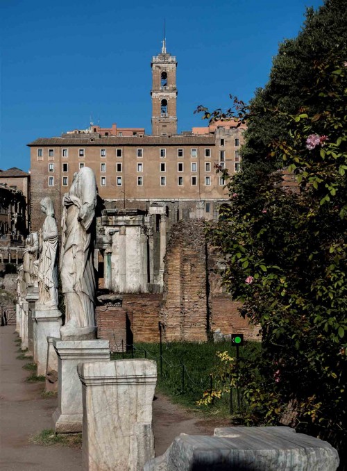 Statues of the Vestals in the atrium of the House of the Vestals at the Temple of Vesta, Capitol in the background