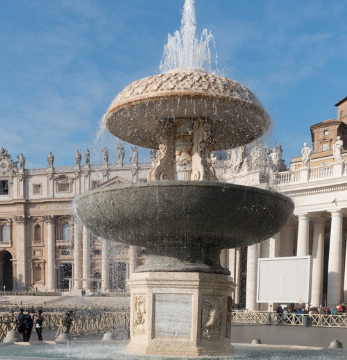 One of the two fountains decorating St. Peter's Square