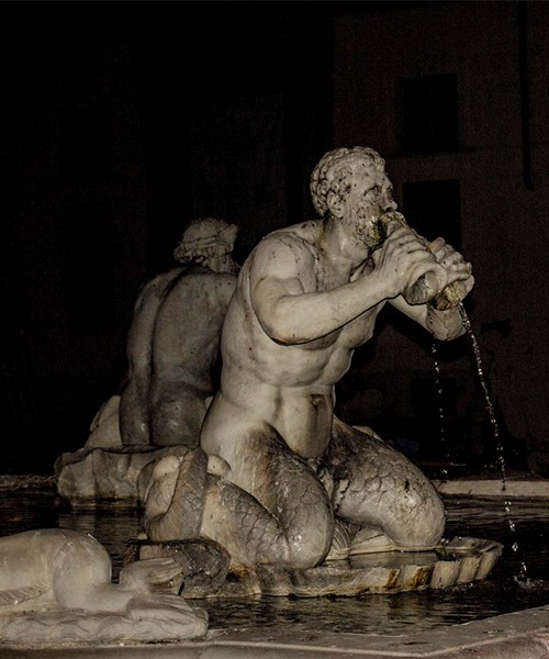 Fontana del Moro, one of the tritons by Giacomo della Porta, Piazza Navona