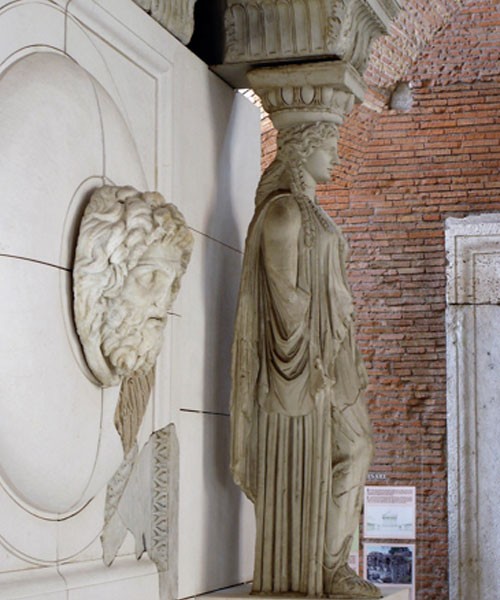 Caryatid and medallion of the colonnade of the Forum of Augustus, Museo dei Fori Imperiali